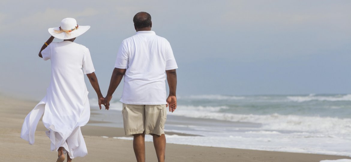 Happy Senior African American Couple Man Woman on Beach